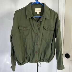 Olive green jacket.  New without tags.  Never worn.  Conch waist for a cute look